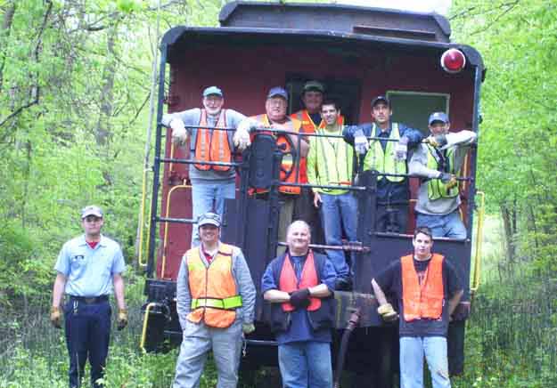 Crew on caboose on curve